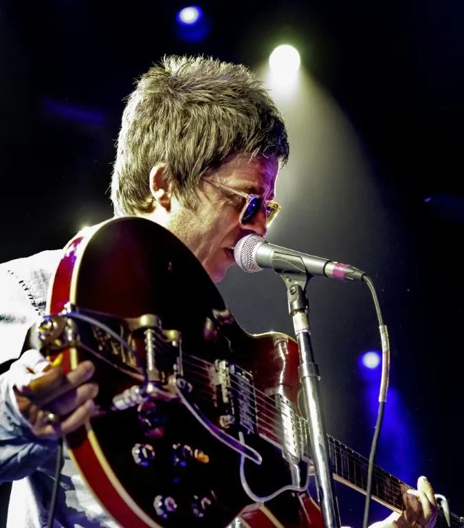 Almost 400,000 USD for the Oasis guitar