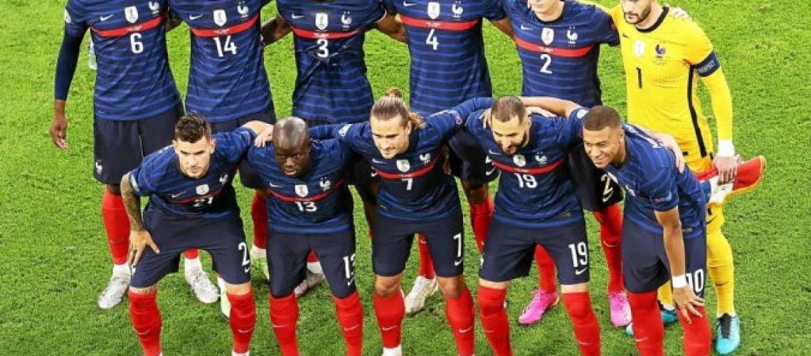 France's starting XI; (L-R top) France's midfielder Paul Pogba, France's midfielder Adrien Rabiot, France's defender Presnel Kimpembe, France's defender Raphael Varane, France's defender Benjamin Pavard and France's goalkeeper Hugo Lloris (L-R bottom) France's defender Lucas Hernandez, France's midfielder N'Golo Kante, France's forward Antoine Griezmann, France's forward Karim Benzema and France's forward Kylian Mbappe pose for the official photograph at the start of the UEFA EURO 2020 Group F football match between France and Germany at the Allianz Arena in Munich on June 15, 2021. / AFP / POOL / ALEXANDER HASSENSTEIN