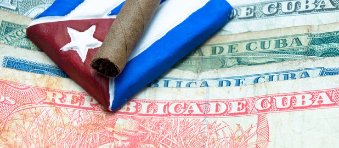 Cuban money and a cigar